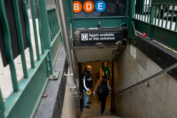 Police investigate after a man was fatally shot on the northbound E train platform of the Seventh Ave. subway station at 53rd St. in Manhattan on Saturday.