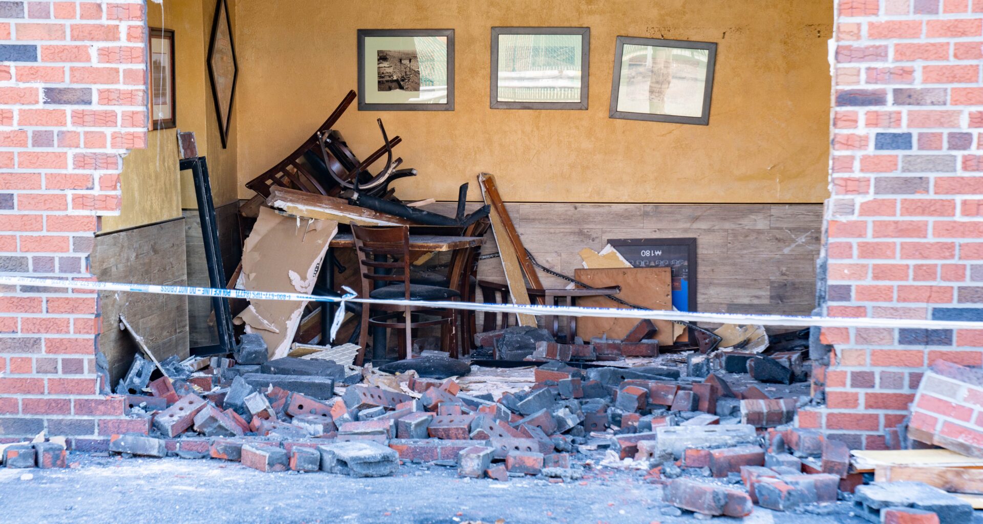 Woman plows into Queens pizzeria in parking mishap, injuring herself and customer