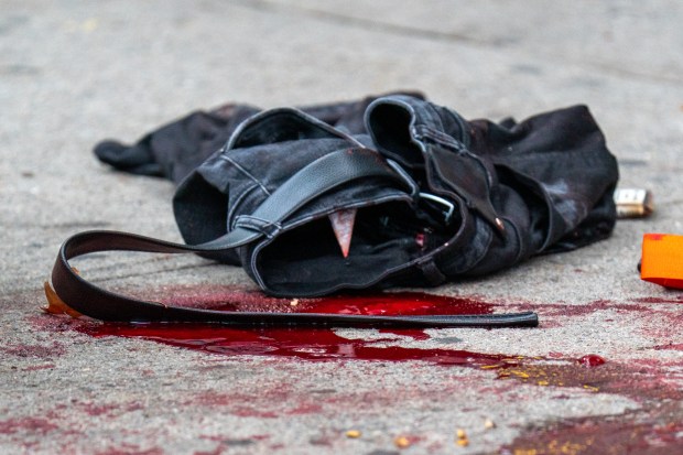 Police investigate after a man was shot in the leg on Steinway St. near 31st Ave. in Astoria, Queens, on Saturday, Oct. 17, 2026. (Theodore Parisienne / New York Daily News)