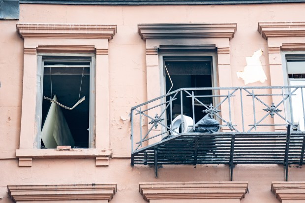Two people were critically injured in a fire that ripped through the fifth floor of an apartment building on W. 49th St. near Eighth Ave. in Hells Kitchen, Manhattan, on Saturday, Oct. 17, 2026. (Theodore Parisienne / New York Daily News)