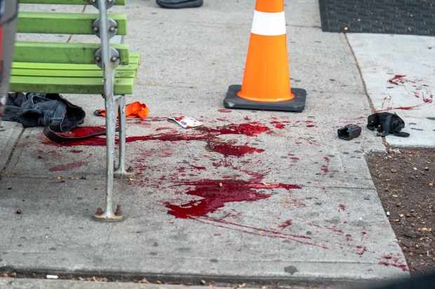 Police investigate after a man was shot in the leg on Steinway St. near 31st Ave. in Astoria, Queens, on Saturday, Oct. 17, 2026. (Theodore Parisienne / New York Daily News)