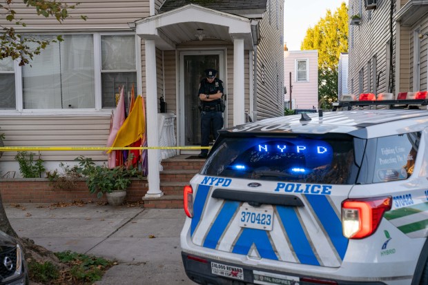 NYPD detectives investigate the day after the death of a 5-year-old girl inside a 110th St. home near 95th Ave. in Richmond Hill, Queens, Thursday, Oct. 15, 2026. 
