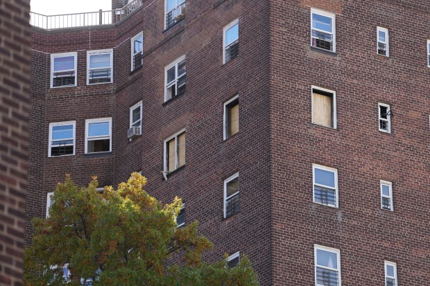 Damage to a building is pictured after a deadly lithium-ion battery fire caused by an e-bike in an 11th-floor apartment in the Patterson Houses on Morris Ave. near E. 140th St. in the Bronx early Wednesday, Oct. 28, 2026. 