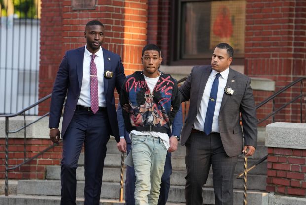 D'Angelo Carabello (center) is pictured in police custody leaving the NYPD's 52nd Precinct stationhouse in the Bronx on Tuesday, Oct. 13, 2026. (Barry Williams / New York Daily News)