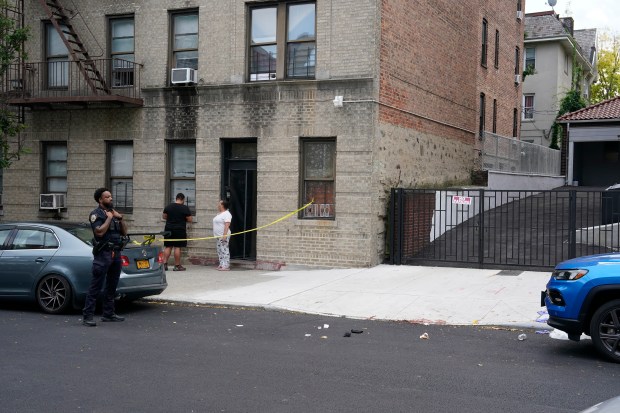 Police investigate on Rochambeau Ave. near E. 206th St. in the Bronx after an off-duty NYPD detective was stabbed and wounded during an attempted robbery near his car parked car on Friday, Oct. 2, 2026. (Barry Williams / New York Daily News)
