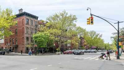 A former limestone bank in Brooklyn is now a multi-level townhouse; this 4,000-square-foot property is listed for over $5 million