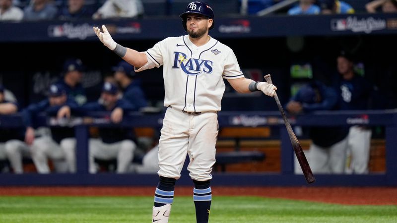 Tampa Bay Rays first baseman Jonathan Aranda looks towards the third base umpire after being called out on strikes during the eighth inning of Game 5 of baseball's World Series, Wednesday, Oct. 28, 2026, in St. Petersburg, Fla., between the Milwaukee Brewers and the Tampa Bay Rays. (AP Photo/Chris O'Meara)