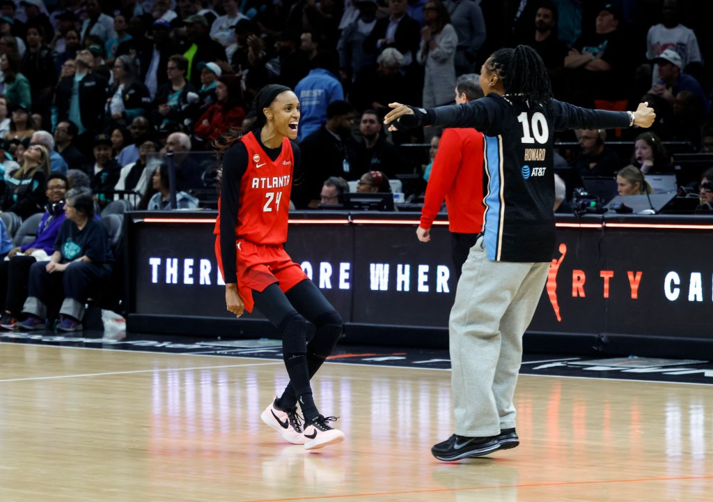 DeWanna Bonner of the Atlanta Dream celebrates a win on the court.