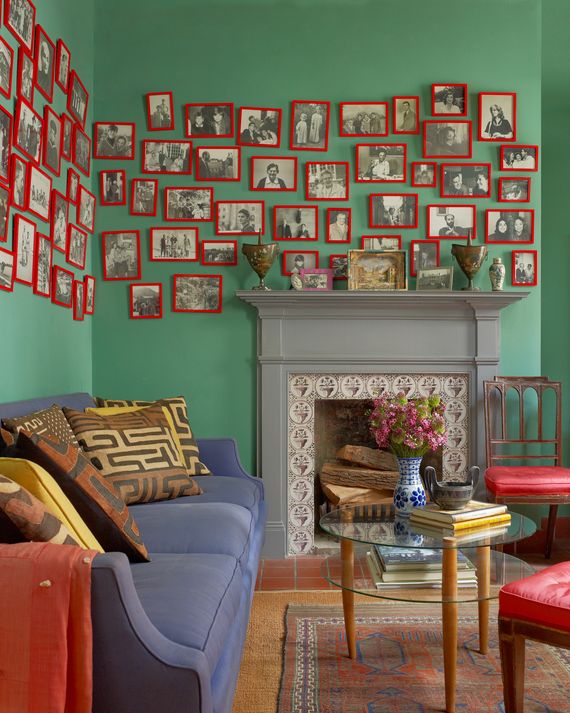 The photos in red frames show members of the Anson family tree, including a British admiral who won 64 acres of Charleston in a game of cards, and his mother, a marchioness.