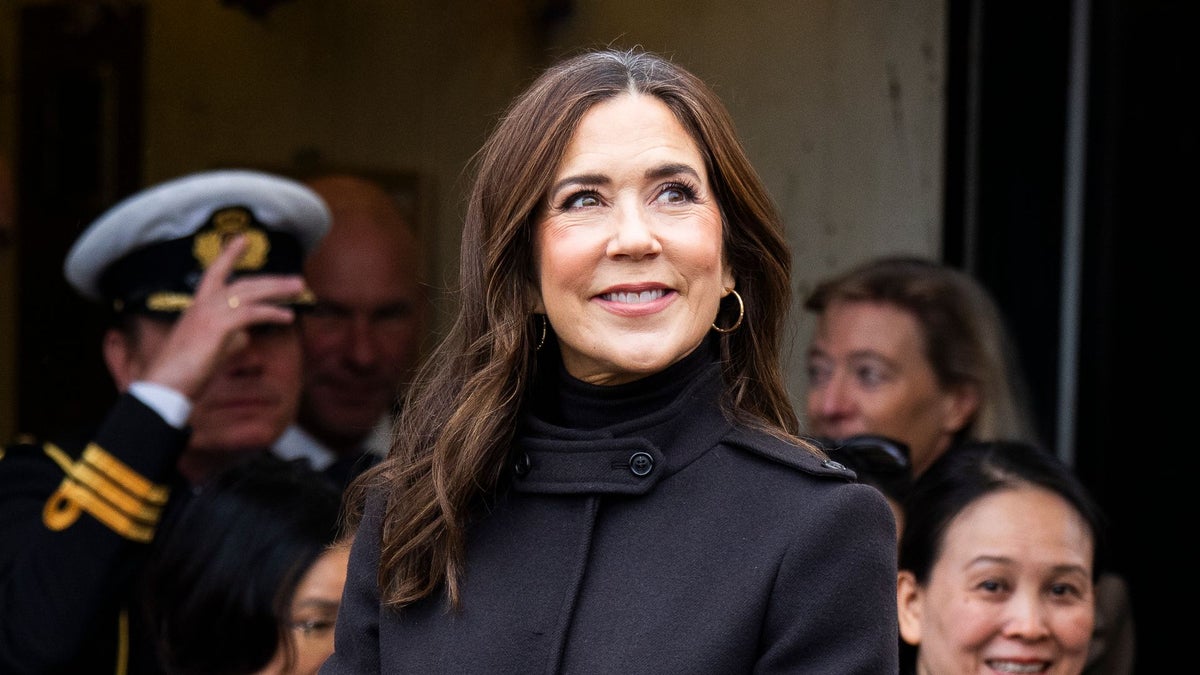 Queen Mary pulls a 20-year-old Prada coat out of her closet and gives it a bold new twist