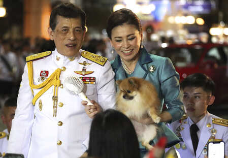 Bangkok:Thai King Maha Vajiralongkorn, left and Queen Suthida, right meet supporters after attending a ceremony to mark an anniversary of the death of King Vajiravudh in Bangkok, Thailand. AP/PTI Photo( Bangkok:Thai King Maha Vajiralongkorn, left and Queen Suthida, right meet suppor...
