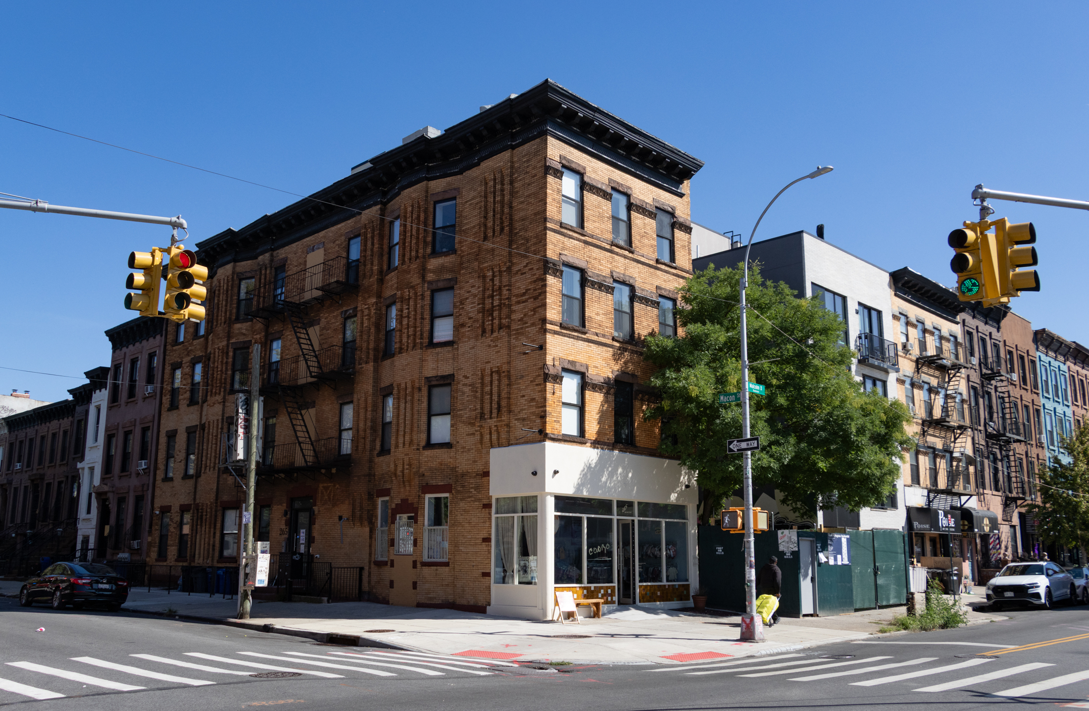 bed stuy - brick building with new storefront