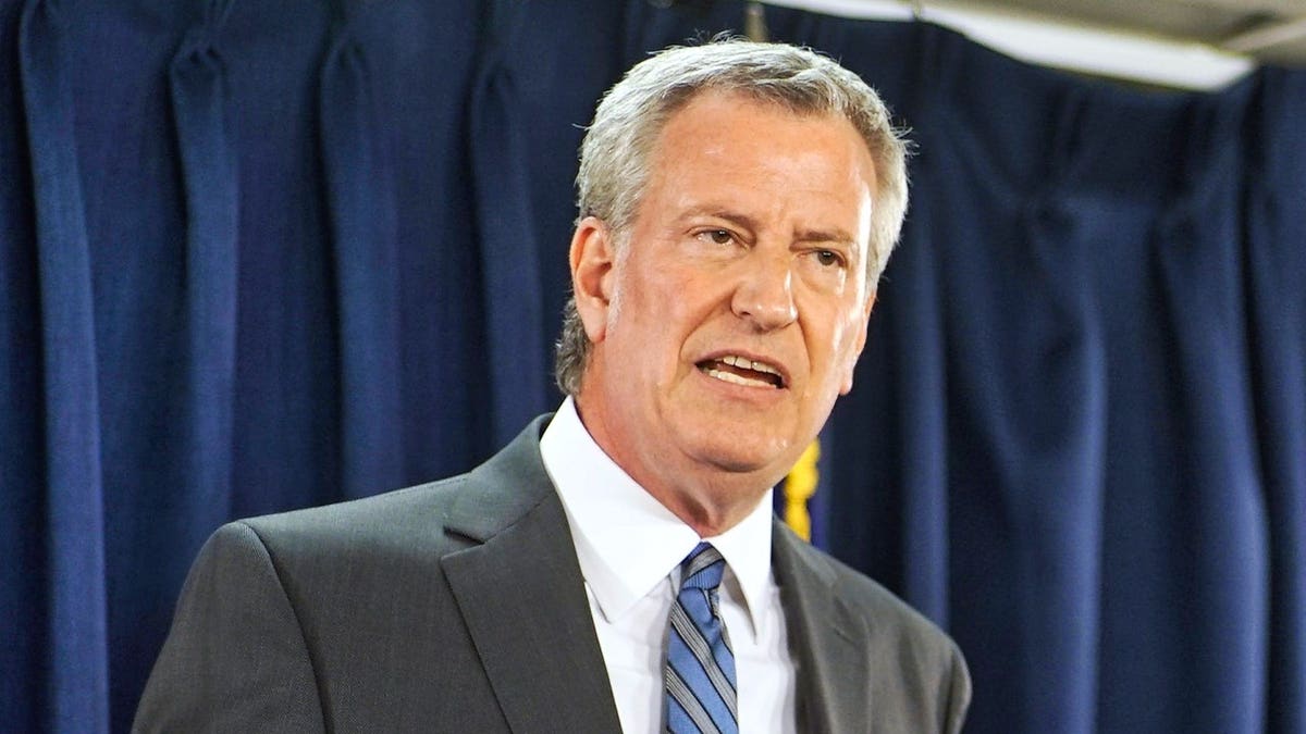 bill de blasio speaking at podium