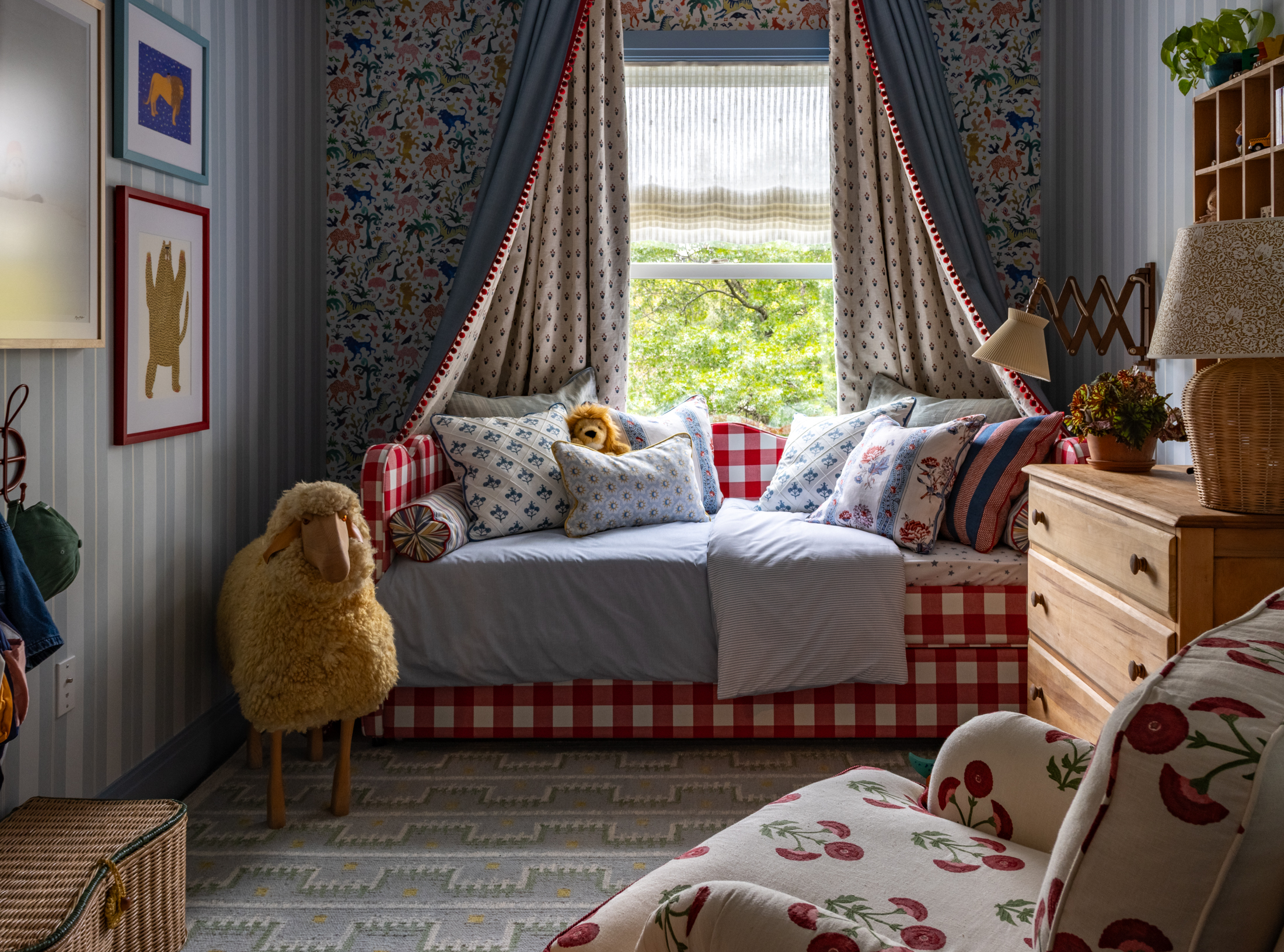 CHILDRENS ROOM - bed with red, white and blue linens and childrens toys