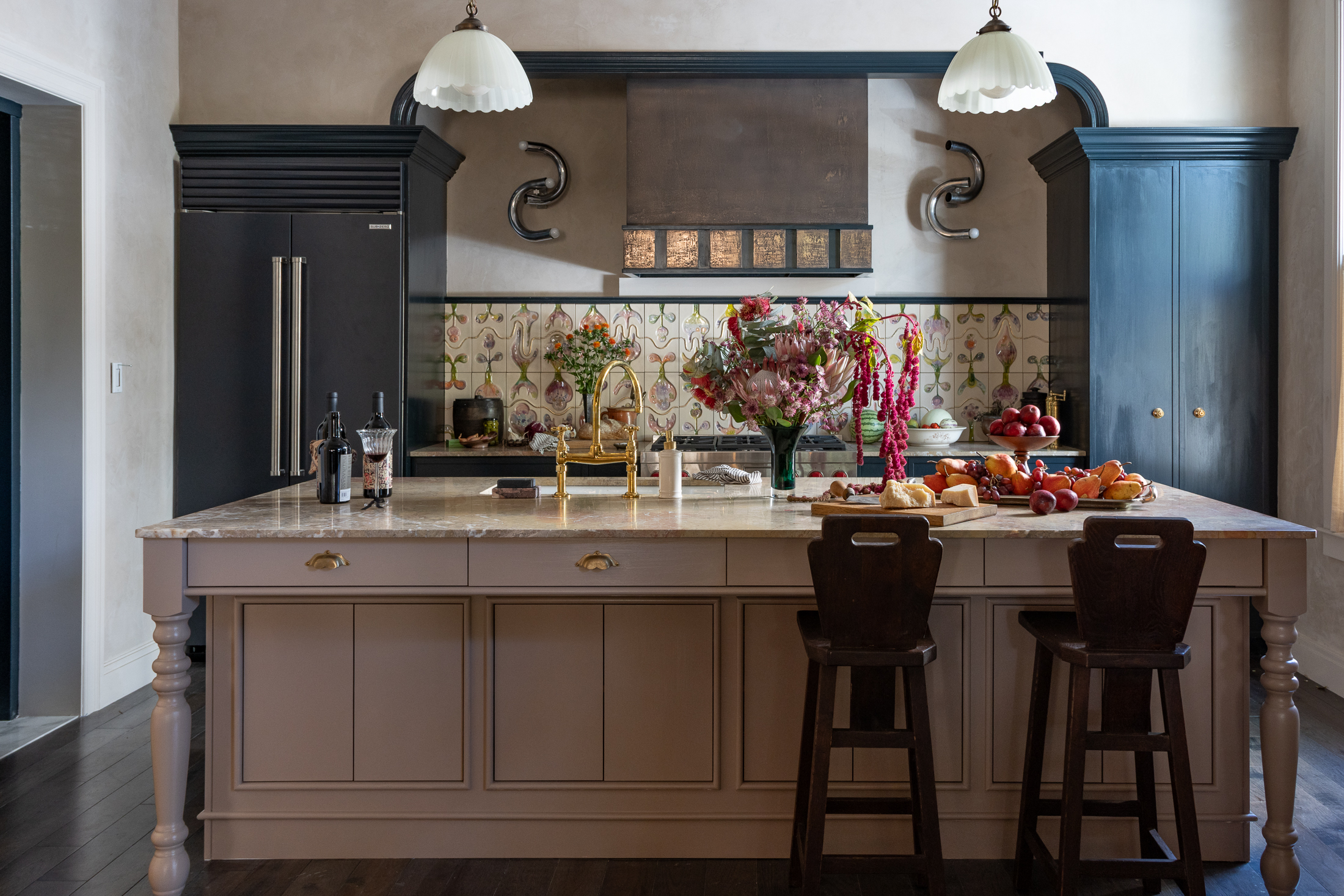 kitchen with large island, blue cabinets