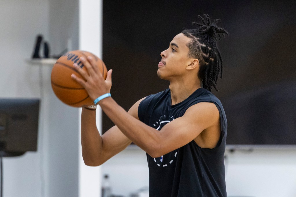 Brooklyn Nets' Mikel Brown Jr. shoots a basketball during practice.