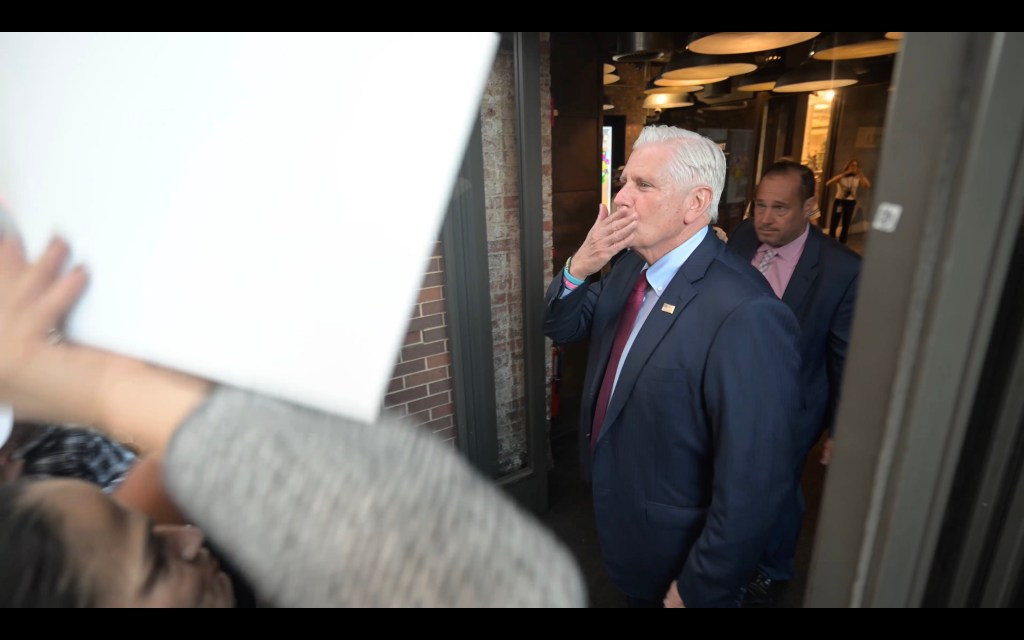 Bruce Blakeman blows a kiss to supporters at NY1 studios