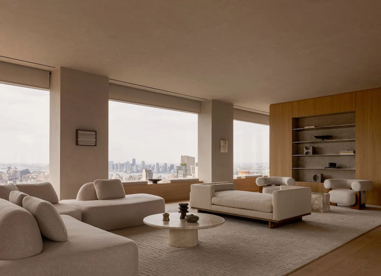 Sculptural architecture and serene interiors creating a sophisticated column-free luxury retreat above Manhattan.