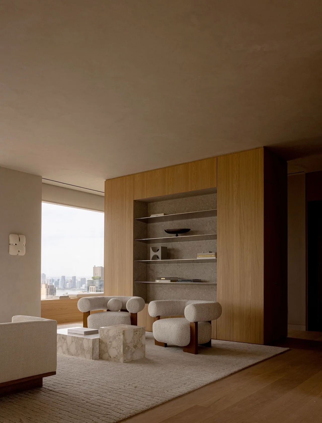 Luxury kitchen featuring high-end fixtures, an island, and bar stools.