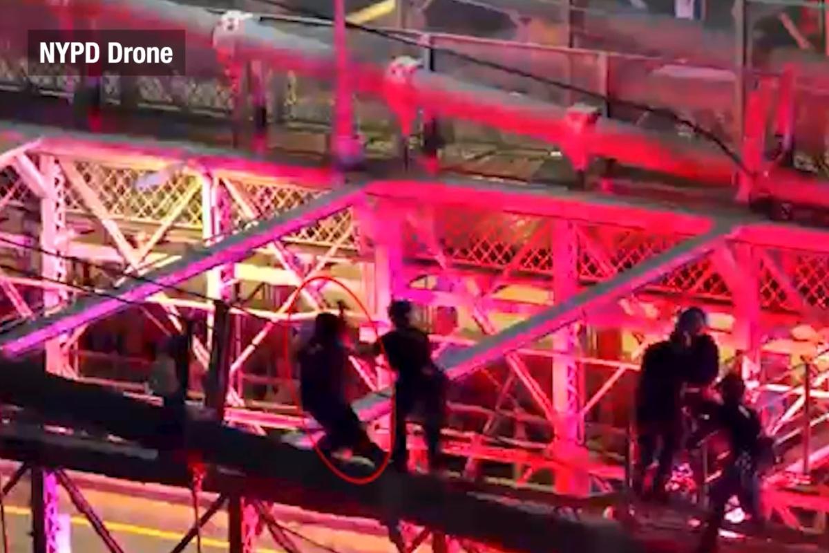Drone footage captures moment police fatally shoot knife-wielding nut -- as he lunges at them from atop the Brooklyn Bridge