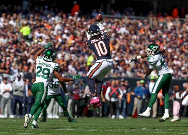 Bears wide receiver Luther Burden III makes the catch during the first quarter of their game on Oct. 4, 2026, at Soldier Field in Chicago. (Brian Cassella/Chicago Tribune)