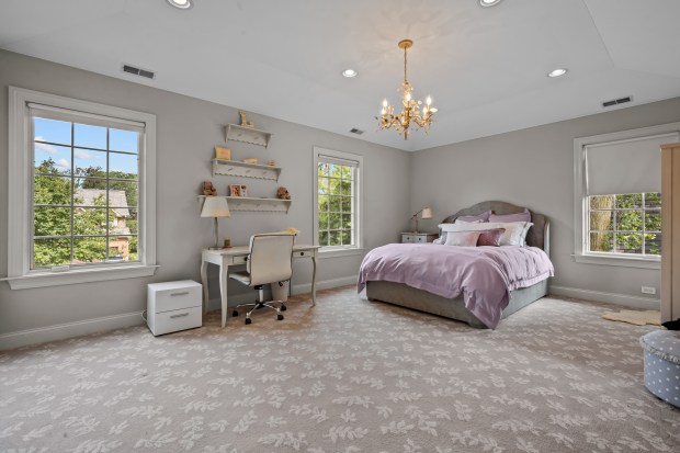 This five-bedroom house at 911 Queens Lane in Glenview has a lower level with a recreation room, an exercise room, a wine cellar, and a bedroom and full bath with steam shower. (Phil Goldman/Summit Imaging)