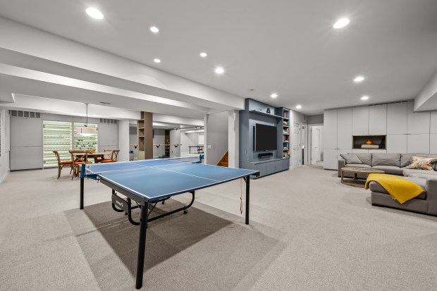 This five-bedroom house at 911 Queens Lane in Glenview has a lower level with a recreation room, an exercise room, a wine cellar, and a bedroom and full bath with steam shower. (Phil Goldman/Summit Imaging)