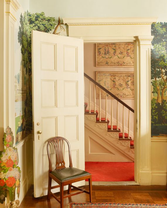 A view of the stairs from the front parlor, where ceilings are 14 feet high.
