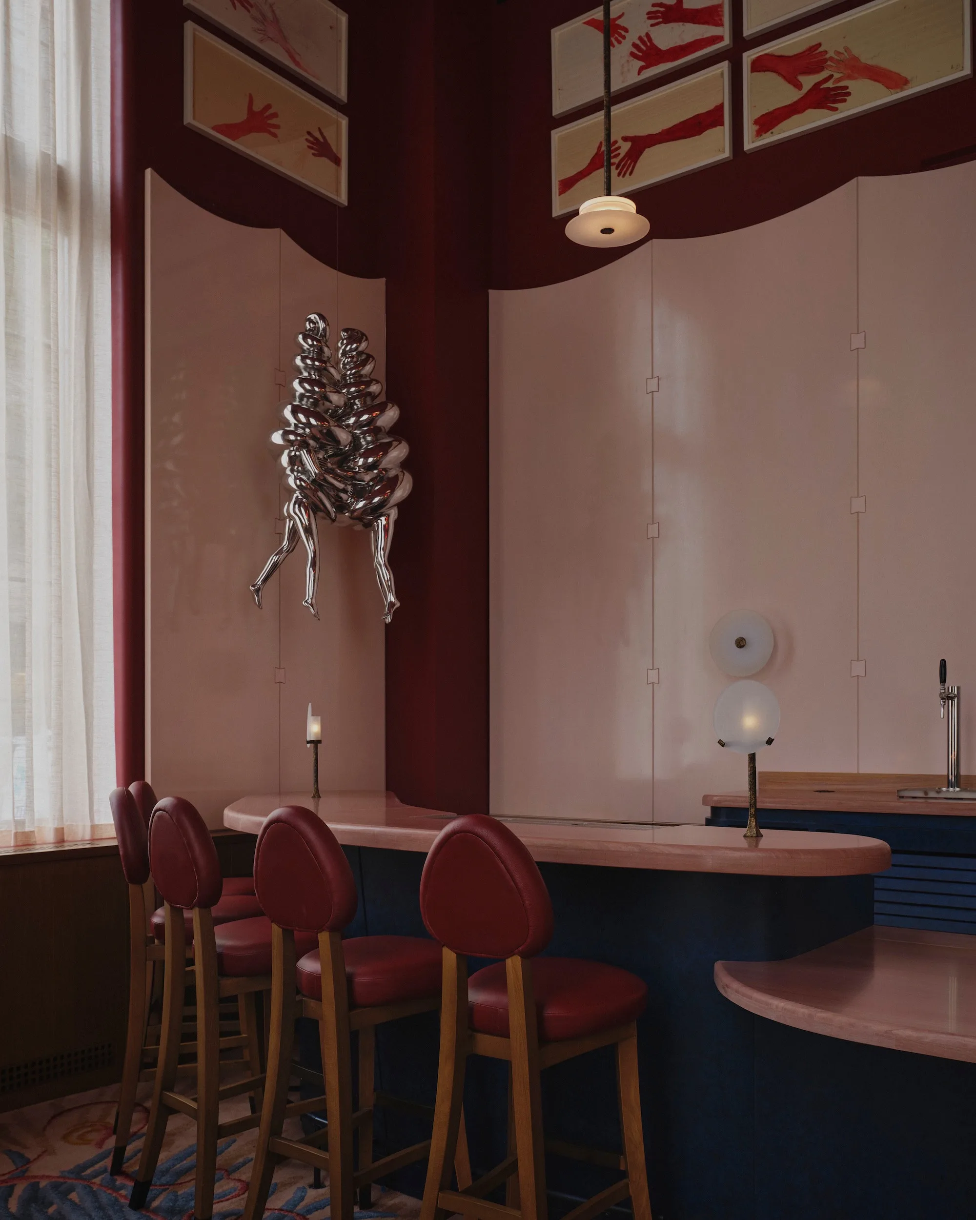 Dining tables set elegantly for guests in Humm New York restaurant.