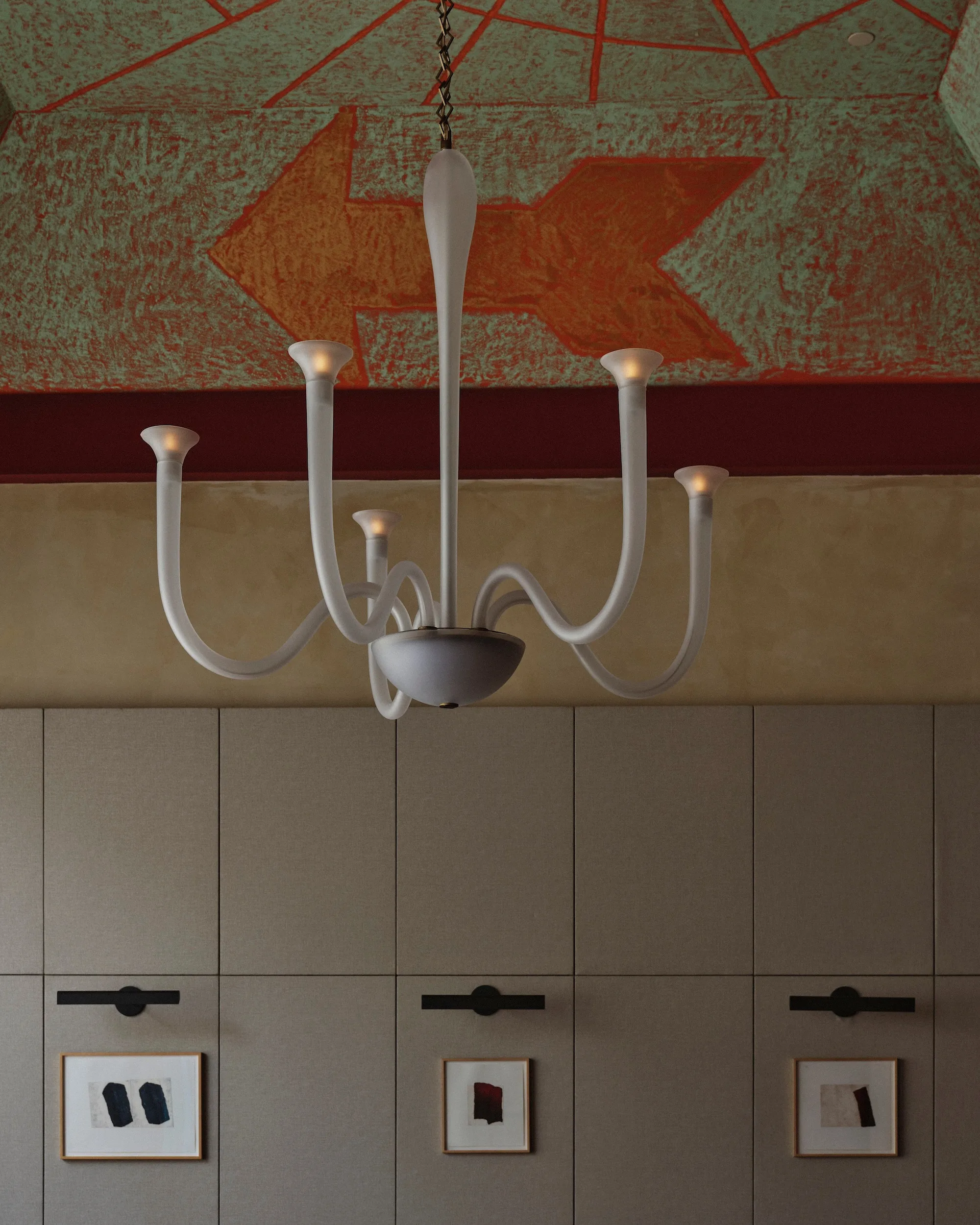 Elegant lighting fixtures illuminating the dining area in Humm New York.