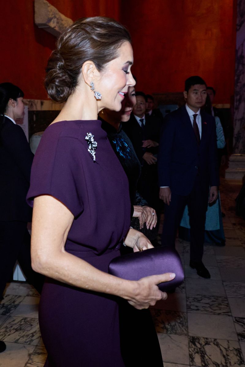 The Danish Queen demonstrated her signature approach to royal dressing, combining timeless wardrobe staples with sophisticated modern silhouettes.