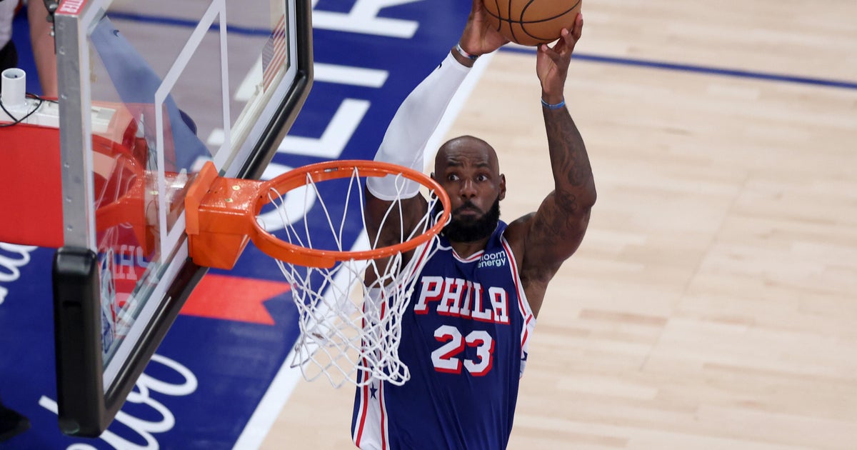 LeBron James talks smack with New York Knicks fans, drops 14 points in victorious Philadelphia 76ers debut