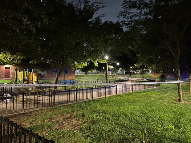 Police are on the scene after a 14-year-old was shot and killed in the courtyard of the Ocean Bay Houses in Far Rockaway, Queens, on September 21, 2026. (Kerry Burke / New York Daily News)