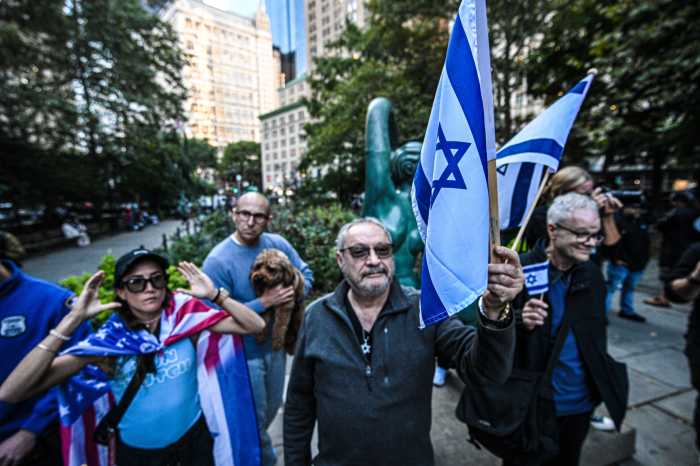 group of people holding Israeli flag