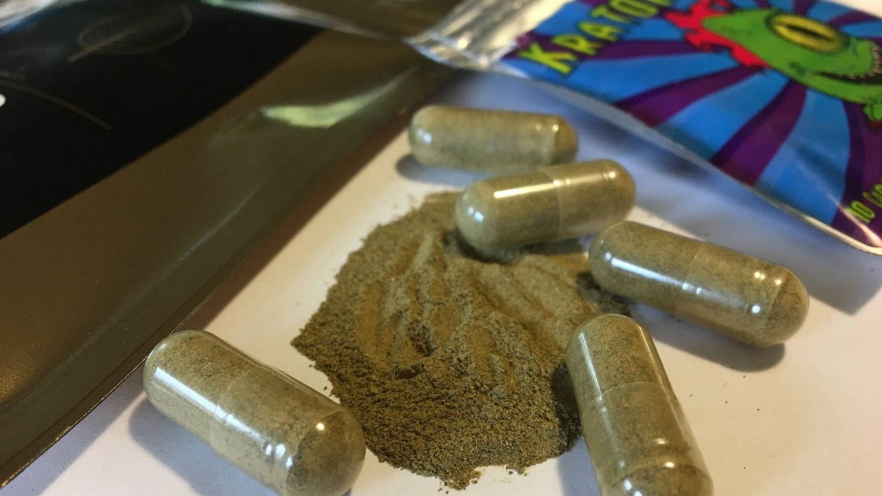 capsules filled with a brown powder