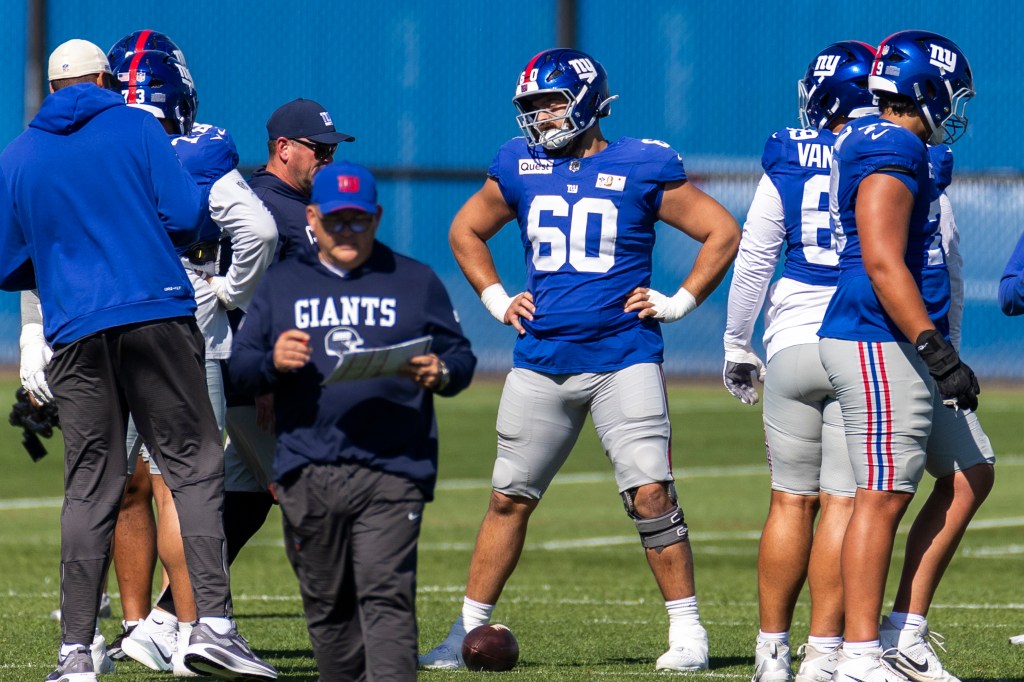 New York Giants center Bryan Hudson (60) looks on during practice.