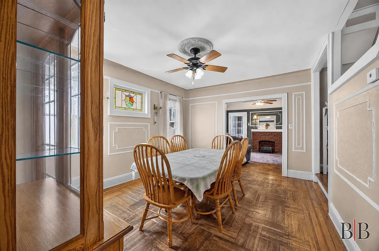 dining room with wood floor, stained glass