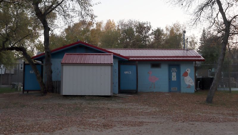 a pool change building at a camp