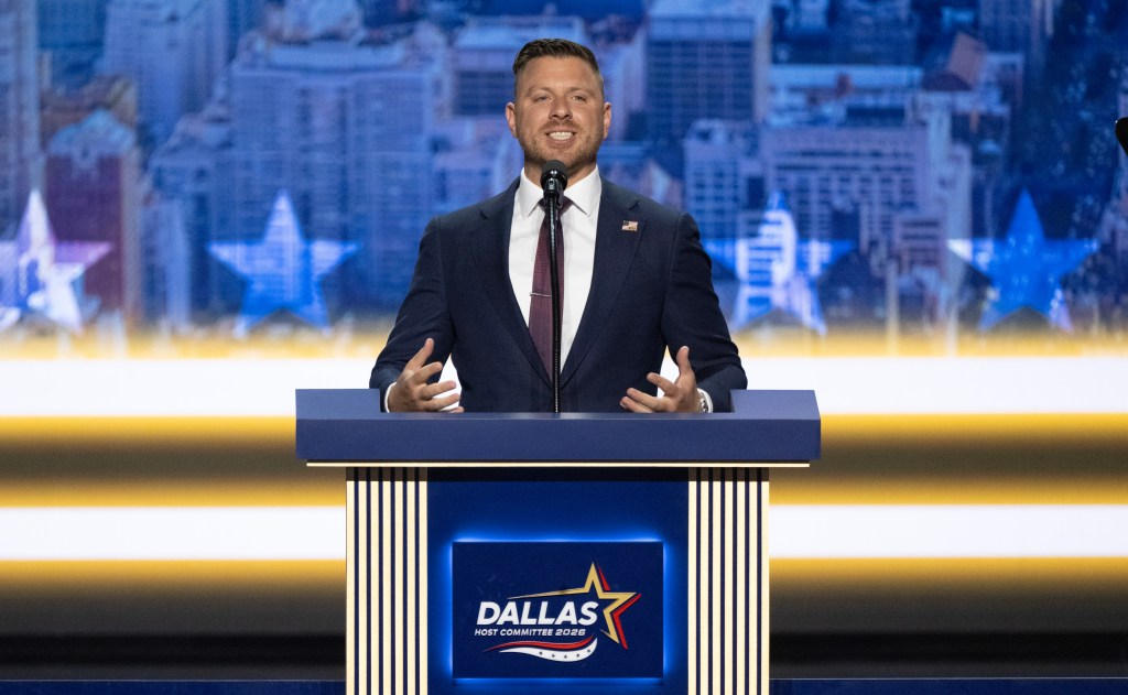 Mike LiPetri speaks at a podium during the Republican Midterm Convention.
