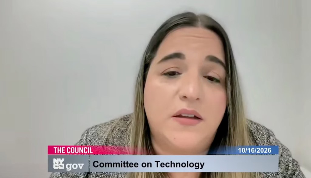 AI-generated image of New York Council Speaker Julie Menin displayed during a council hearing.