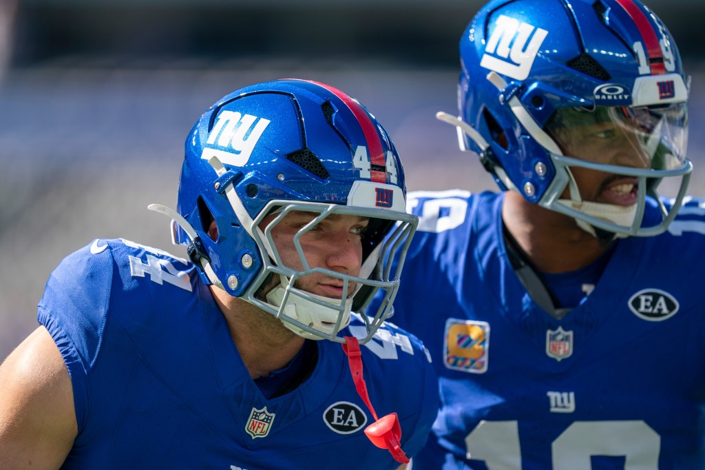 New York Giants running back Cam Skattebo (44) and quarterback Jameis Winston (19) warm up.