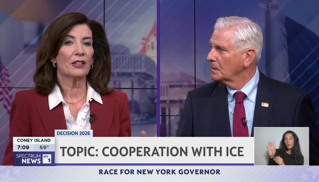 New York Governor Kathy Hochul and challenger Bruce Blakeman during a televised debate on cooperation with ICE.