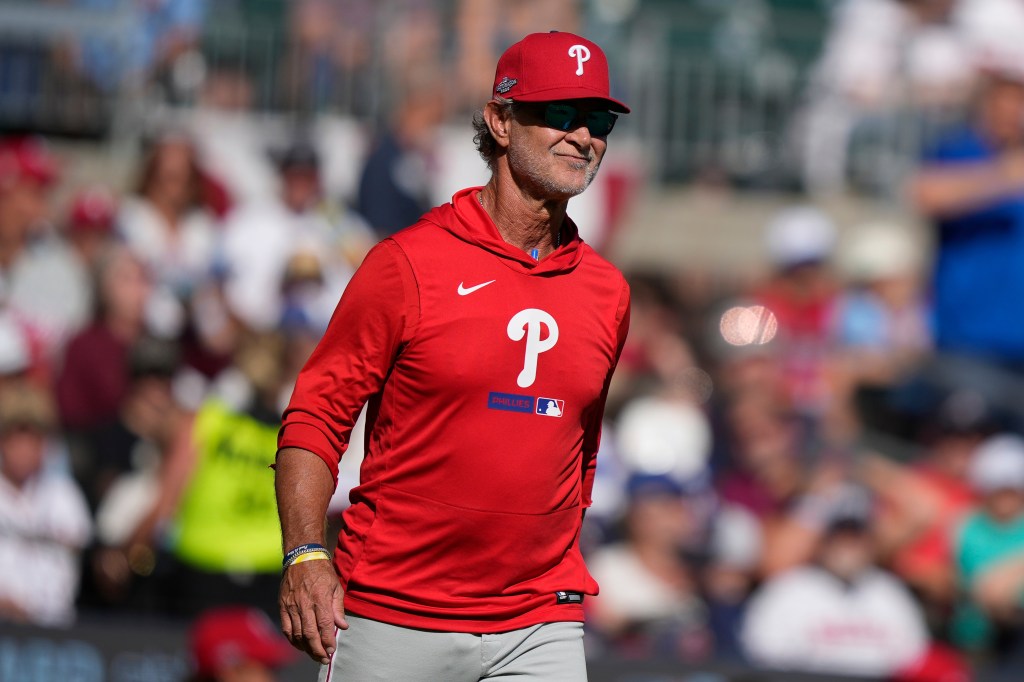 Philadelphia Phillies interim manager Don Mattingly walks to the mound against the Atlanta Braves in the seventh inning during Game 2 of baseball's National League Wild Card Series Wednesday, Sept. 30, 2026, in Atlanta.