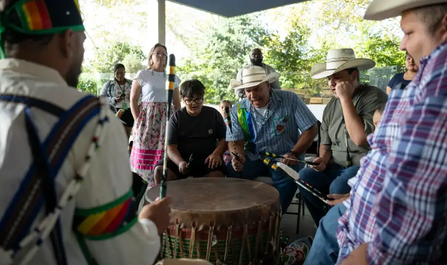 A Native American family performs a drum circle during the United Lenape/Lunáapeew Nations Pow Wow at Prospect Park on Saturday, Oct. 3.
