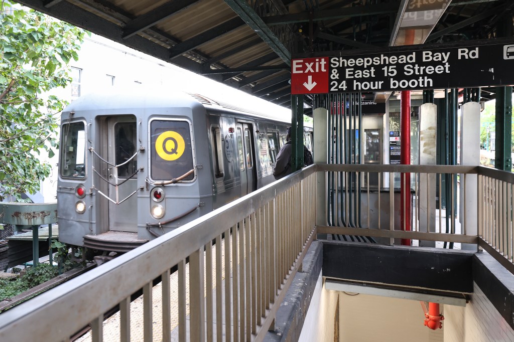 A Q train arriving at the Sheepshead Bay station.