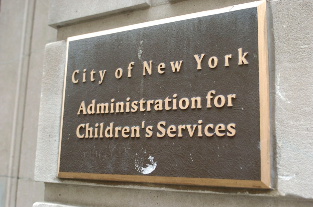 Plaque reading "City of New York Administration for Children's Services"