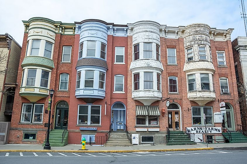A historic townhouse building on Warren Street in Hudson, New York