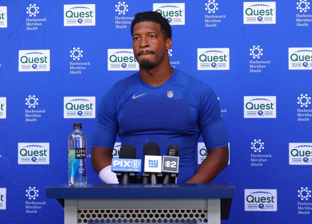 New York Giants quarterback Jameis Winston speaks at a press conference.