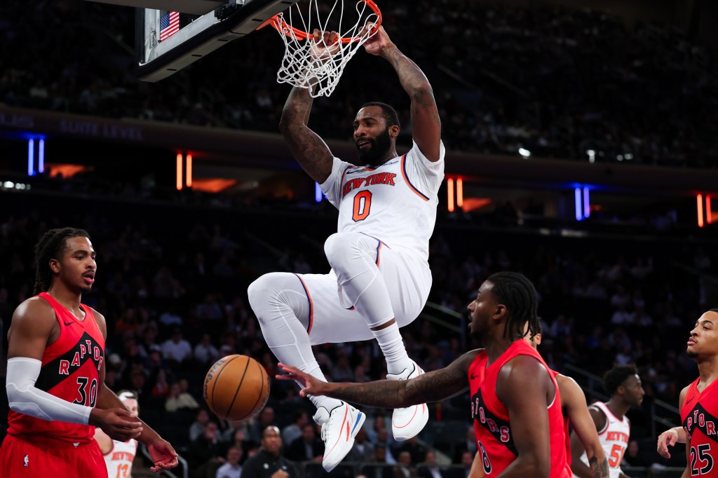 Andre Drummond #0 of the New York Knicks dunks against the Toronto Raptors.