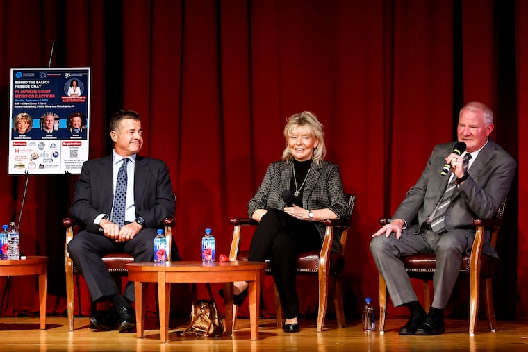 Justices David Wecht, Christine Donohue and Kevin Dougherty sit onstage during a fireside chat featuring the three justices of the Pennsylvania Supreme Court who are on the November retention ballot at Central High School on Monday, Sept. 8, 2025 in Philadelphia. The conversation was moderated by Cherri Gregg, co-host of Studio 2 on WHYY, and presented by the Committee of Seventy, Pennsylvanians for Modern Courts, and the League of Women Voters of Pennsylvania.